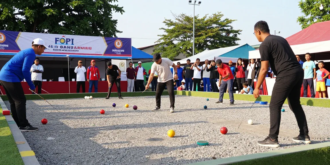Pertandingan petanque di FOPI Kota Banjarbaru, menunjukkan pemain dan suasana meriah, fopikotabanjarba.org.